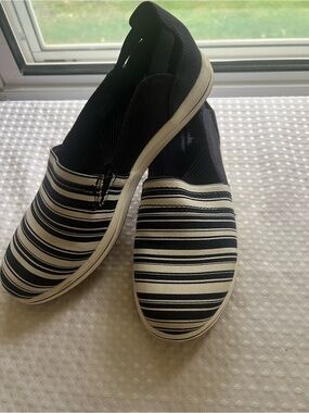 Women’s Clarks Cloudsteppers Slip-On Canvas Shoes in blue and white